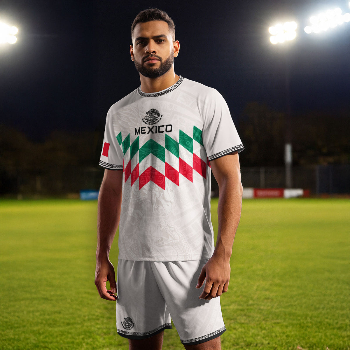 Camiseta de fútbol premium con emblema de águila azteca verde y dorado de México