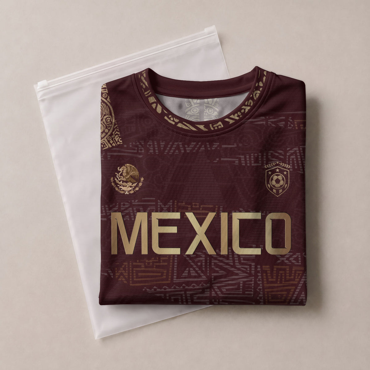 Camiseta de fútbol personalizada de México con herencia azteca, color granate y dorado